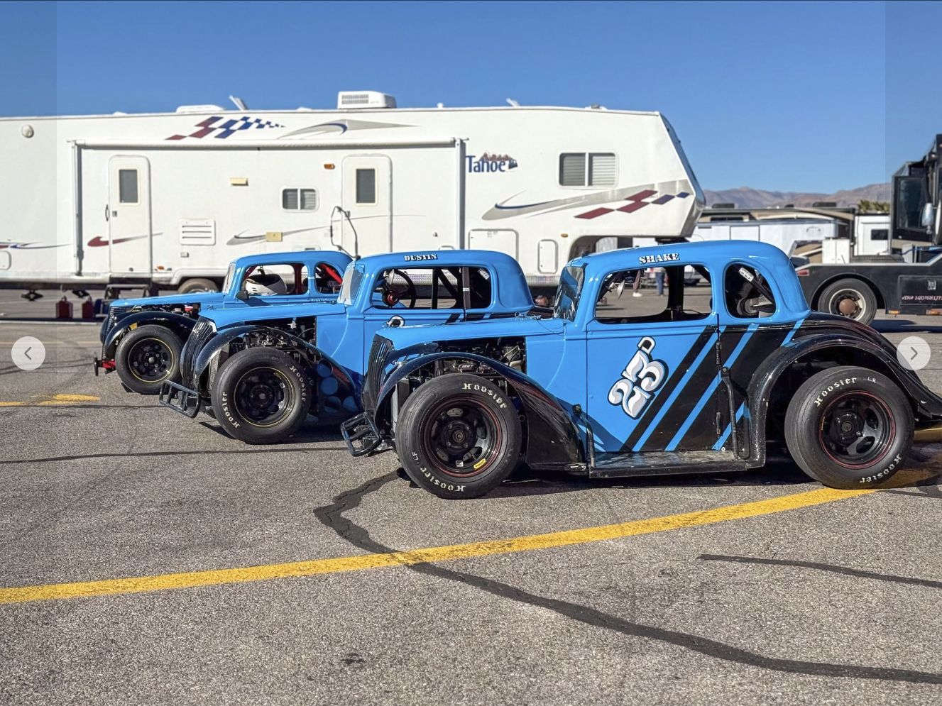 Legends race cars lined up at the track